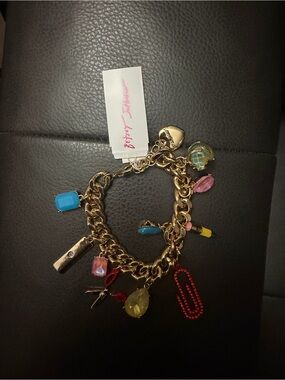 Betsey Johnson Gold Tone Multicolor Charm Bracelet with Blue Pink Red Accents